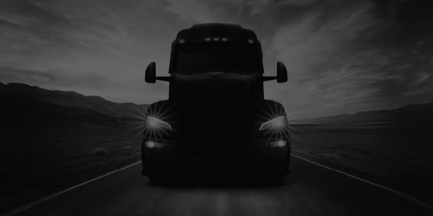 screened Peterbilt truck at night